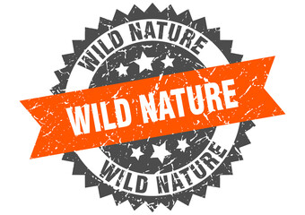 wild nature stamp. grunge round sign with ribbon