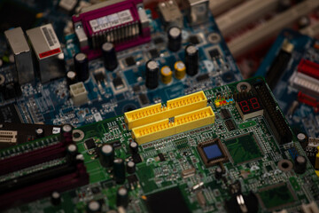 Old disassembled computers. Motherboards. Computer junk.