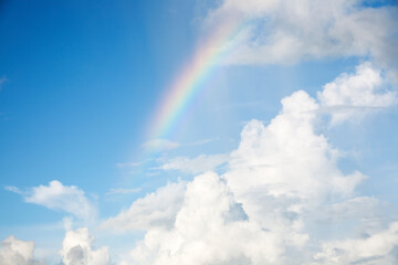 blue sky with rainbow