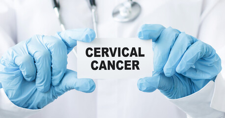 Doctor holding a card with text Cervical Cancer, medical concept