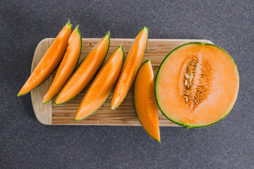 simple food ingredients, close-up of rockmelon on cutting board
