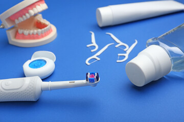 Fototapeta premium Set for oral hygiene on color background