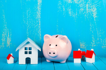Houses and a piggy bank.