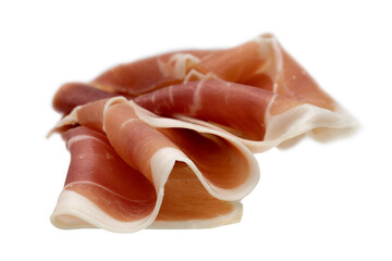 Slice of Italian prosciutto crudo or jamon. Raw ham.