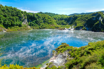 Landscape of hot geothermal Frying Pan Lake in Echo Crater in Waimangu volcanic valley in Rotorua, New Zealand