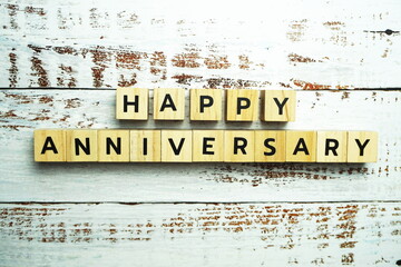 Happy Anniversary alphabet letter with space copy on wooden