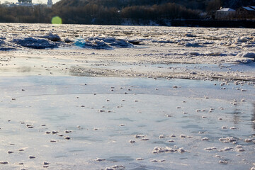 Sparkling ice texture or background. Ice hummock on Frozen River in winter sunny day.
