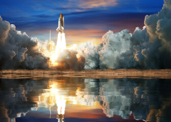 Business Startup Concept : Launch of Space Shuttle Atlantis, Rocket or spaceship take off and flying to sky with reflection on water. (Elements of this image furnished by NASA.)
