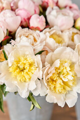 Beautiful white peony flower for catalog or online store. Floral shop concept . Beautiful fresh cut bouquet. Flowers delivery