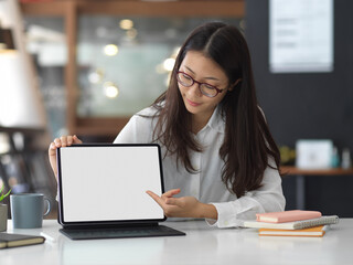 Female presenting with mock up digital tablet screen, clipping path