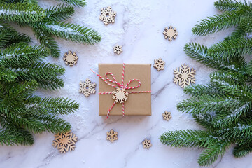 Fototapeta na wymiar Christmas tree and Gift box. Christmas and New Year holiday background. festive winter season concept. flat lay