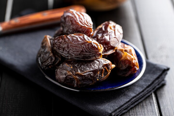Dried dates fruit on plate
