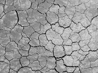 high angle view of crack soil ground in black and white photography