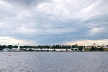 Fototapeta na wymiar Yaroslavl. Volga embankment, the view from the river. Historical buildings, the building of the school for girls of spiritual rank.