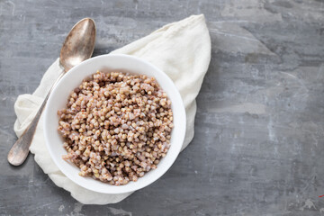 boiled green buckwheat in white bowl