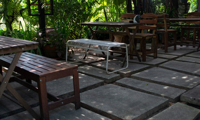 Obraz premium chair in the garden in the evening 