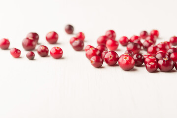 Red cranberry on white background. Healthy food concept.