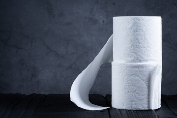Toilet roll on black background