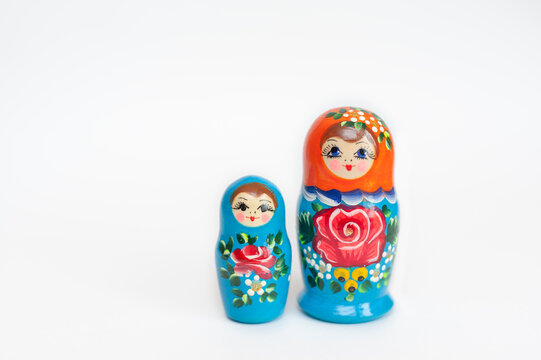 set of wooden dolls of 2 pieces on a white background