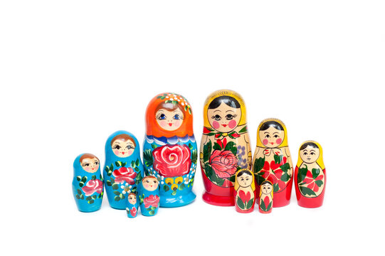 set of wooden dolls of 10 pieces on a white background