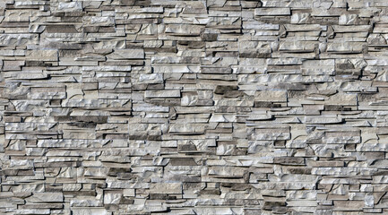 Seamless texture of clinker tiles or bricks on the wall in the form of wild stone