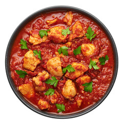 Chicken Madras Curry in black bowl isolated on white. Indian cuisine dish with with chicken meat and spicy masala gravy. Asian food and meal.
