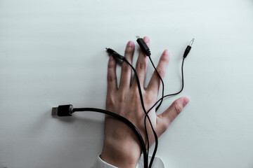 Cables and woman cybork hands.