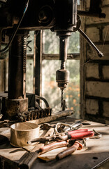 Set of old rusty tools in a working repair shop