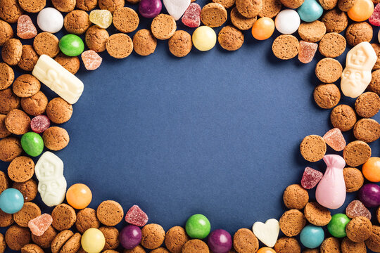 Dutch Holiday Sinterklaas Background With Kruidnoten Cookies And Traditional Hollands Sweets. Concept For Children Party Saint Nicolas Day Five December With Copy Space. Top View, Overhead.