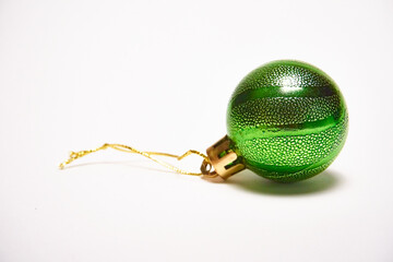 Green Christmas ball on a white background, New Year, Christmas toys, holiday, Christmas.