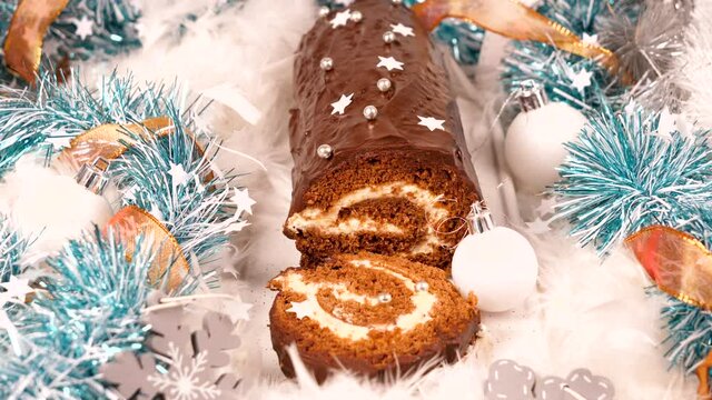 chocolate yule log- christmas chocolate cream pastry and decoration