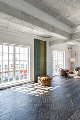Fototapeta premium Chic, luxurious guest room design with old-fashioned antique furniture. white walls are decorated with relief. there is a beautiful dark brown parquet on the floor.