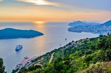 View of the Adriatic Sea, Lokrum Island and Dubrovnik in the evening at sunset. Croatia.