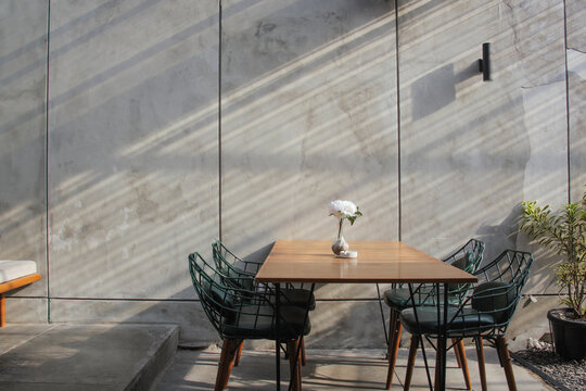 Interior Design : Dining Room With Industrial Background Concrete Wall And Pot Plant 