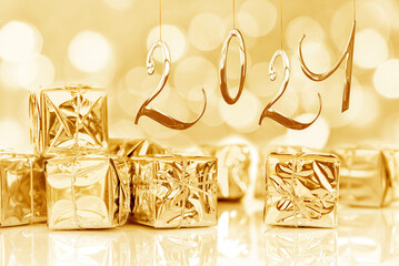 2021, new year card, small Christmas gifts in shiny golden paper, bokeh lights background