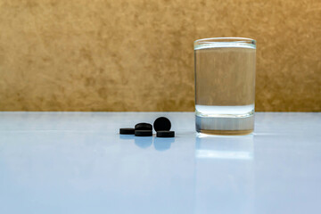Vodka in glasses on a blue background