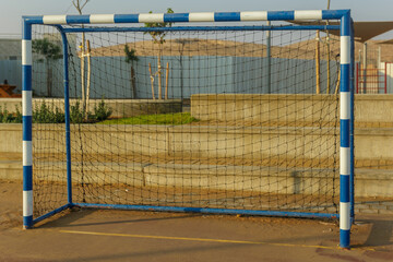 White and blue striped mini football gate