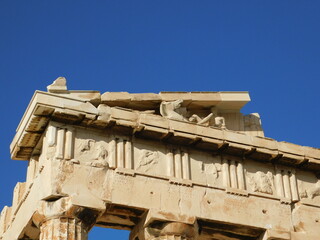 Sculptures on the upper part of the Parthenon, the ancient temple of goddess Athena, in Athens, Greece