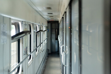 Empty corridor in the sleeping car of train. Rail travel.