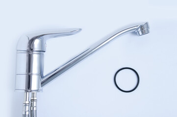 Chrome plated water tap and sanitary rubber gasket faucet. White background.