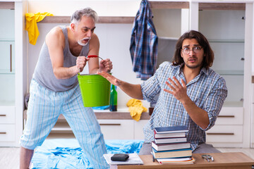 Young son student and dad alcoholic