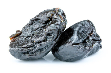 dry prunes isolated on white background