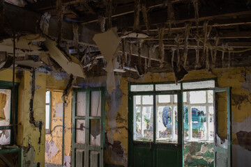 abandoned house in a decaying disastrous state