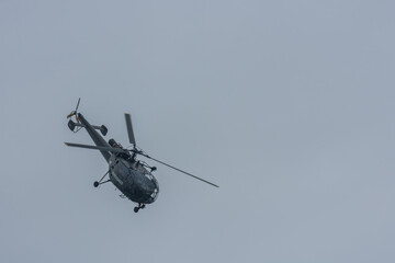 Fototapeta na wymiar helicopter flies down at a air show