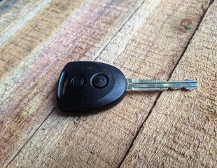car keys on a wooden background