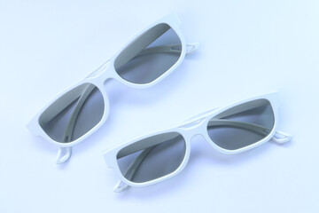 white 3d glasses are on the white background
