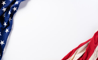 American flags against white background. Flat lay with copy space. Happy Labor Day concept.