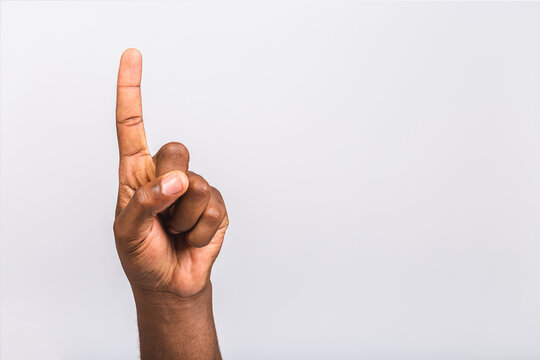 Black african american male hand point finger. Hand gestures - man pointing at virtual object with index finger isolated on white background. - Powered by Adobe