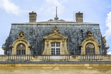 Fragments of old Chantilly Grand Stables near Chateau de Chantilly (Chantilly Castle, 1560) - historic chateau. Chantilly, Oise, Picardie, France.