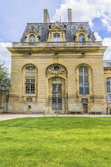 Fragments of old Chantilly Grand Stables near Chateau de Chantilly (Chantilly Castle, 1560) - historic chateau. Chantilly, Oise, Picardie, France.